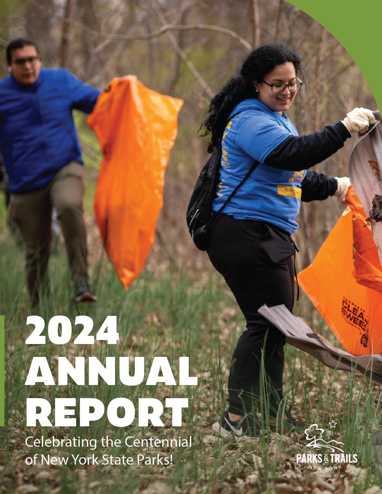 The cover of the 2024 annual report, which depicts a volunteers picking up litter.