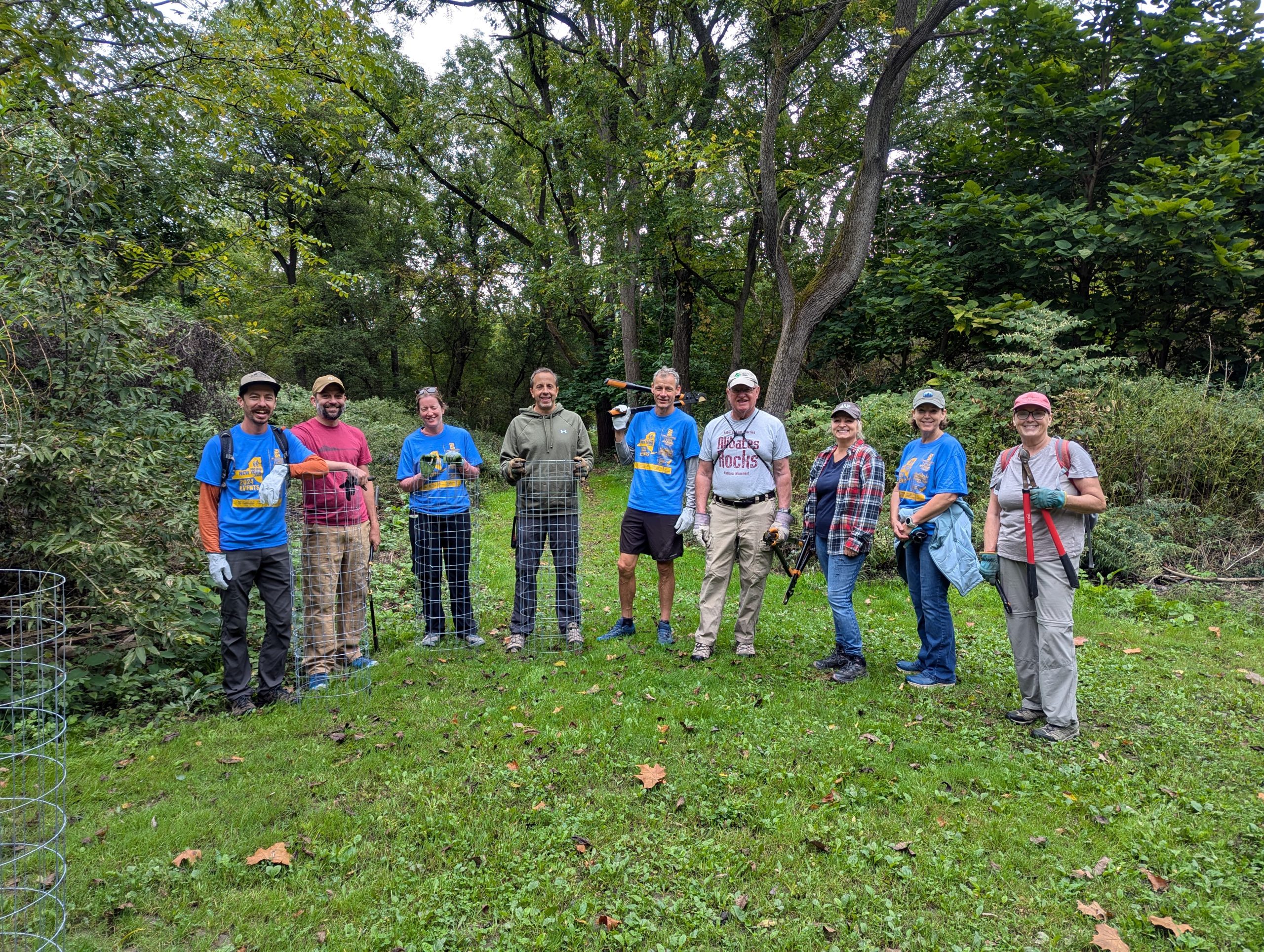 A group of volunteers pose for a photo.