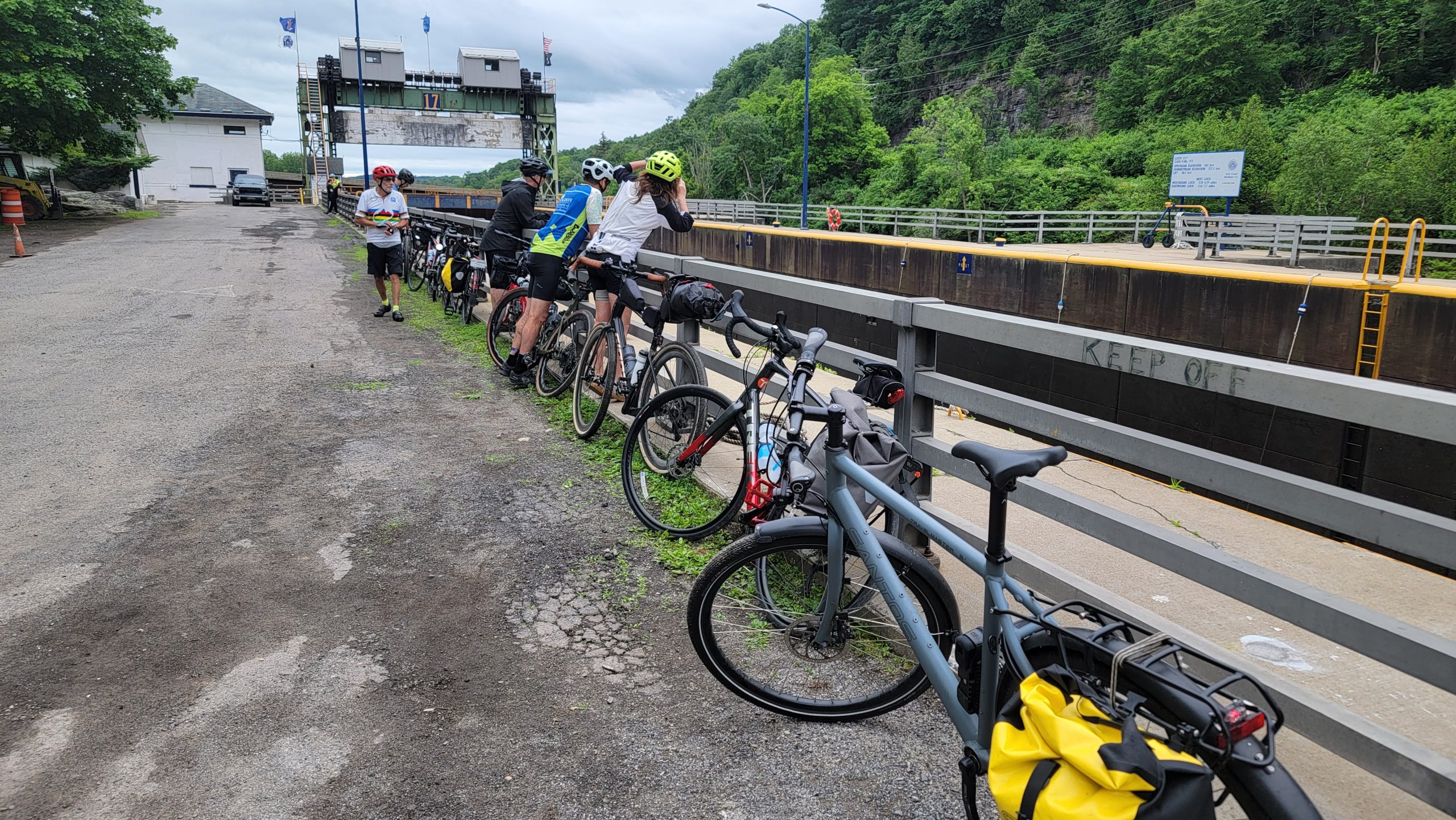 Bikes lined up along the railing of a Lock along the Erie Canal.